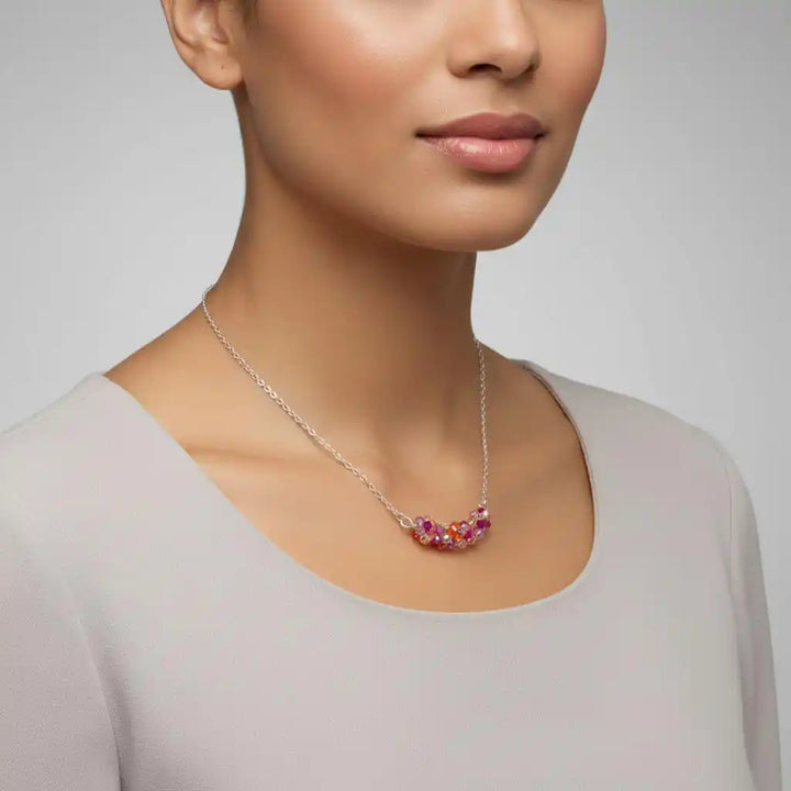 Silver Multi Color Spring Blossom Crystal Necklace worn by a model showcasing its vibrant Swarovski crystals.