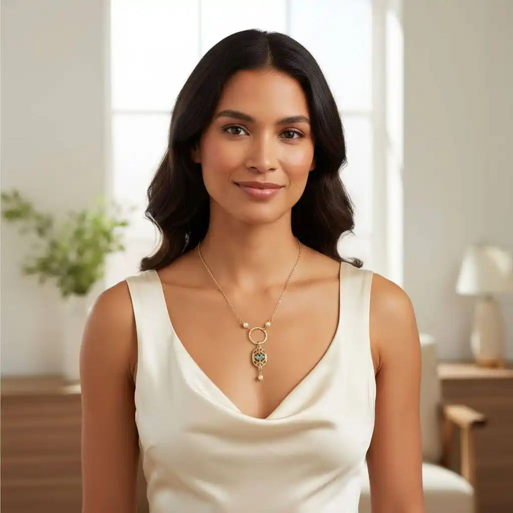 14 K Gold-Filled Hammered Open Circle Filigree Necklace worn by a woman in a bright, modern setting.