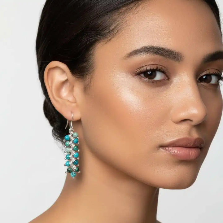 Seen On Jane The Virgin Silver Turquoise Wire Coil Earrings worn by model, showcasing bohemian elegance and artisan design.