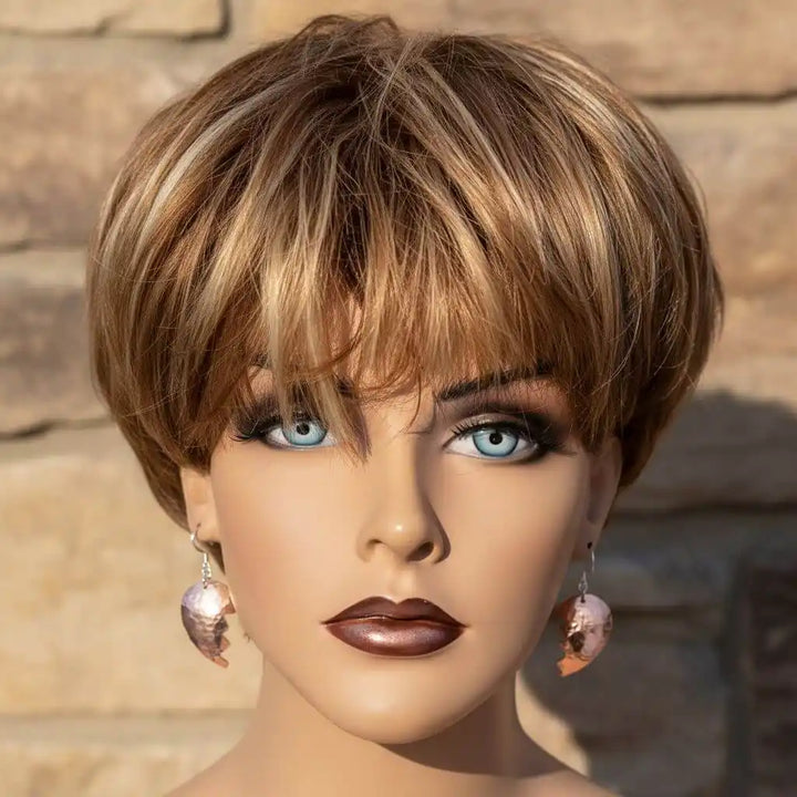 Handmade Sculpted Copper Broken Heart Earrings worn by a mannequin with a stylish haircut and makeup.