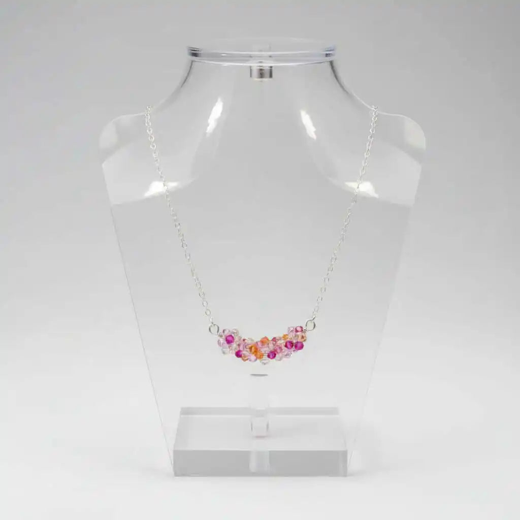 Silver Multi Color Spring Blossom Crystal Necklace displayed on a clear mannequin bust.