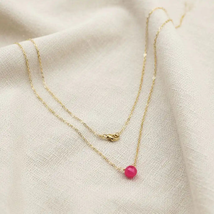 Tiny Hot Pink Chalcedony Gold Filled Necklace featuring a bright hot pink chalcedony drop on a gold chain.