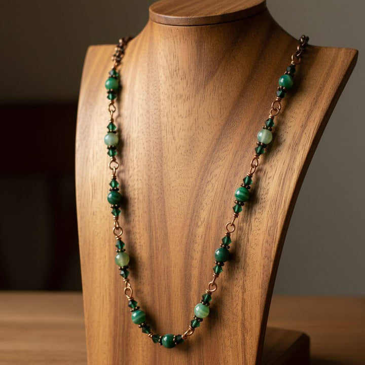 24 inches emerald agate wire wrapped necklace featuring multi-toned emerald-striped agate gemstones on display.