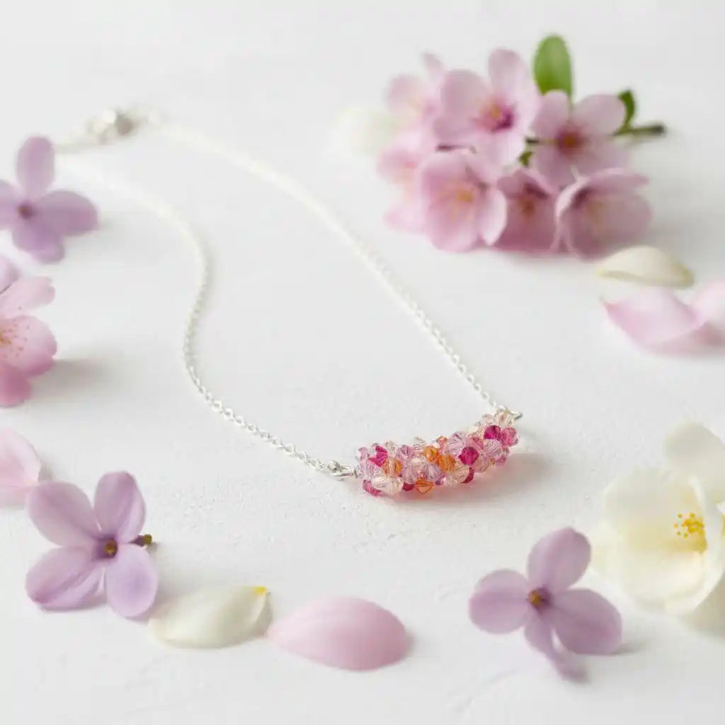 Silver Multi Color Spring Blossom Crystal Necklace with vibrant crystals surrounded by delicate flowers.