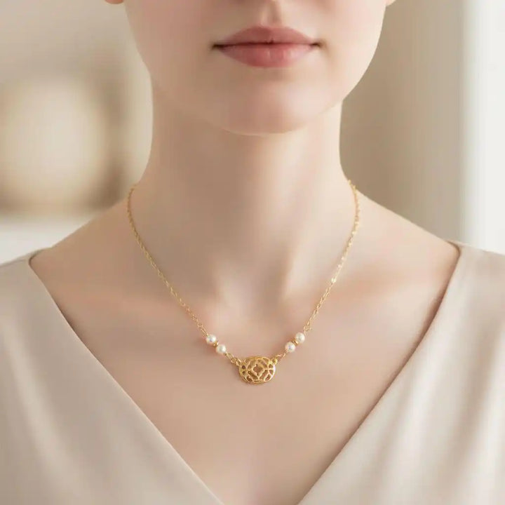 As Seen on Molly Ringwald Gold Filled Pearl Choker Necklace worn by a model with a neutral background.