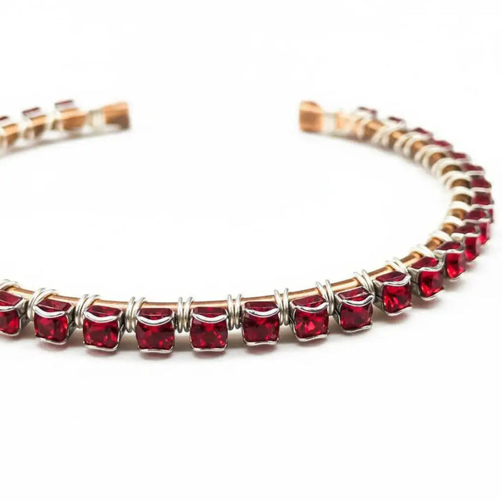 Wire Wrapped Red Crystal Tennis Bracelet Bangle showcasing sparkling red Swarovski crystals in a handcrafted design.