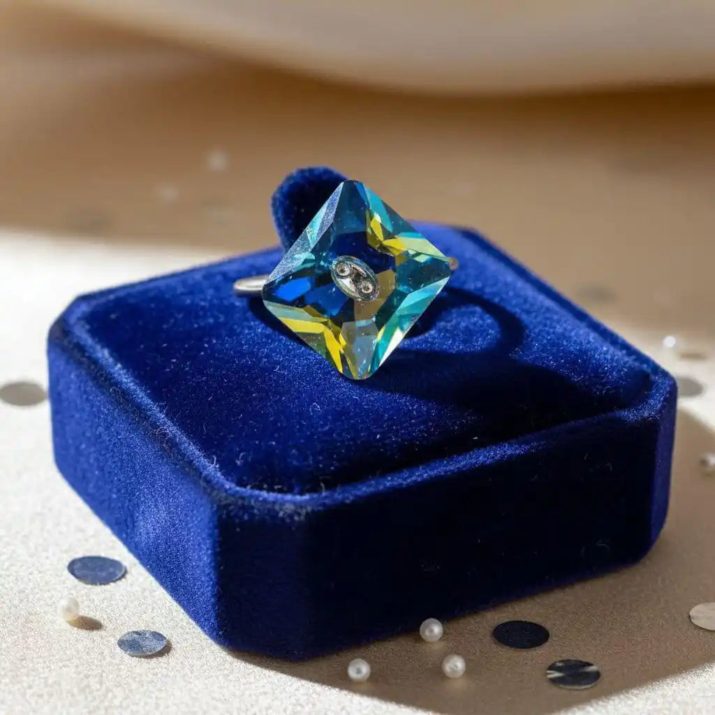 As Seen on Maisie William Super Sparkly Crystal Bling Ring displayed on a blue velvet box.