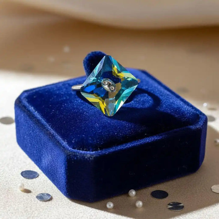As Seen on Maisie William Super Sparkly Crystal Bling Ring displayed on a blue velvet box.