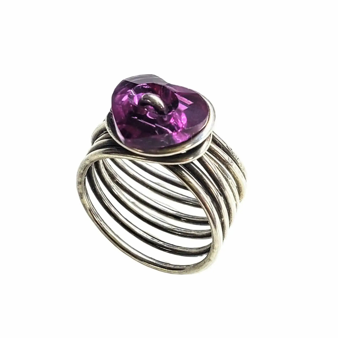 Handmade Jewelry All Silver and Copper Rings featuring a silver ring with a purple gemstone.