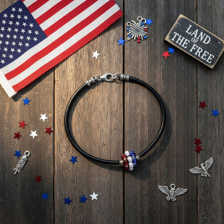 Patriotic Red White Blue Beaded Bead Leather Bracelet on wooden surface with American flag and stars