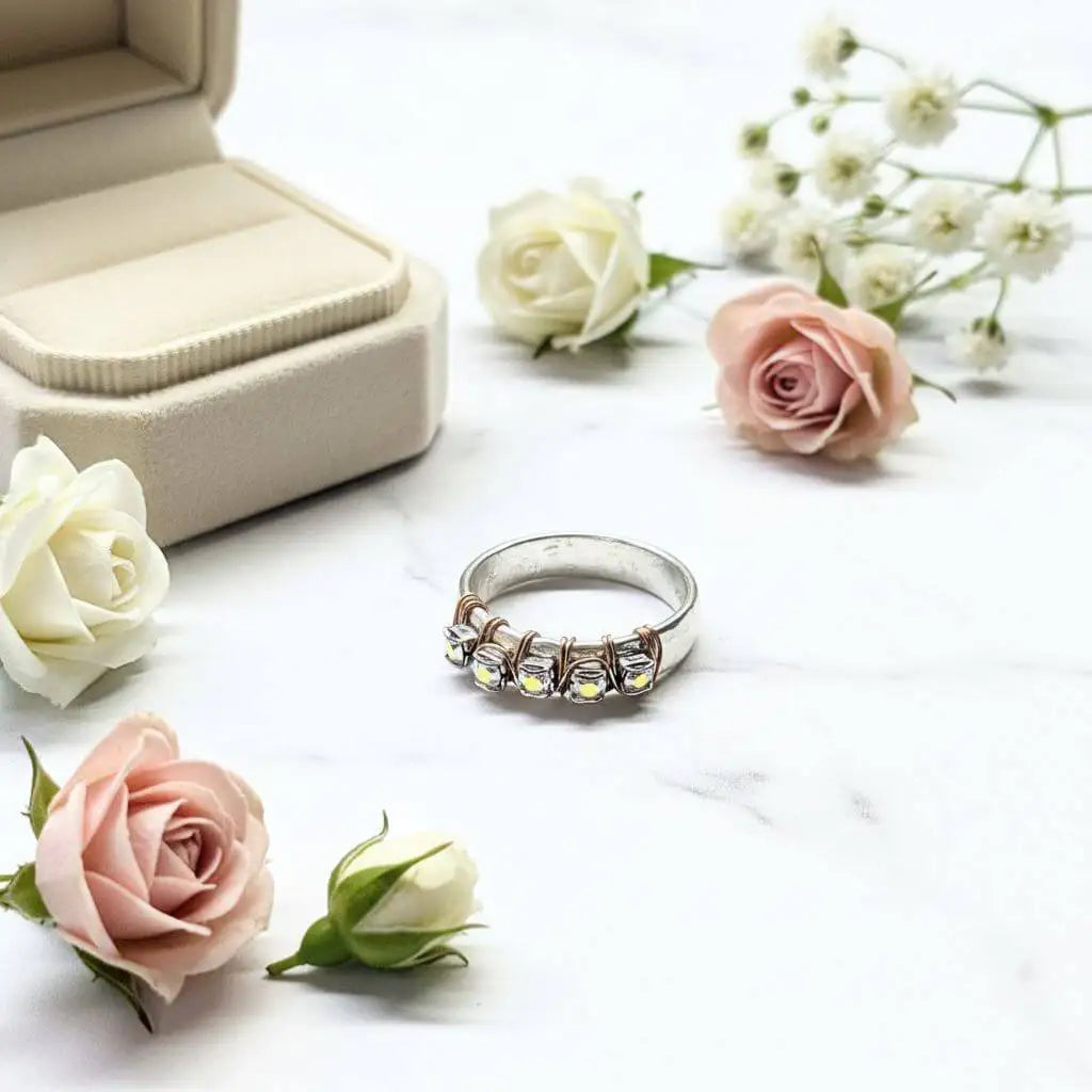 Rose Gold Filled Wire Wrapped Sparkly Crystal Bling Ring displayed with roses and a ring box, showcasing elegant handmade jewelry.
