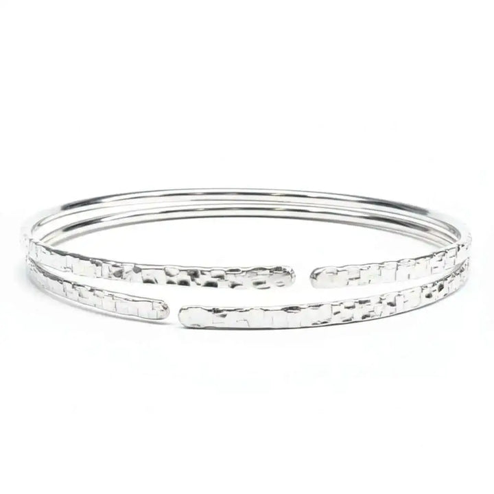 10 Gauge 925 Silver Hammer Textured Bangle showcasing a sleek design with a hammered finish for a stylish look.
