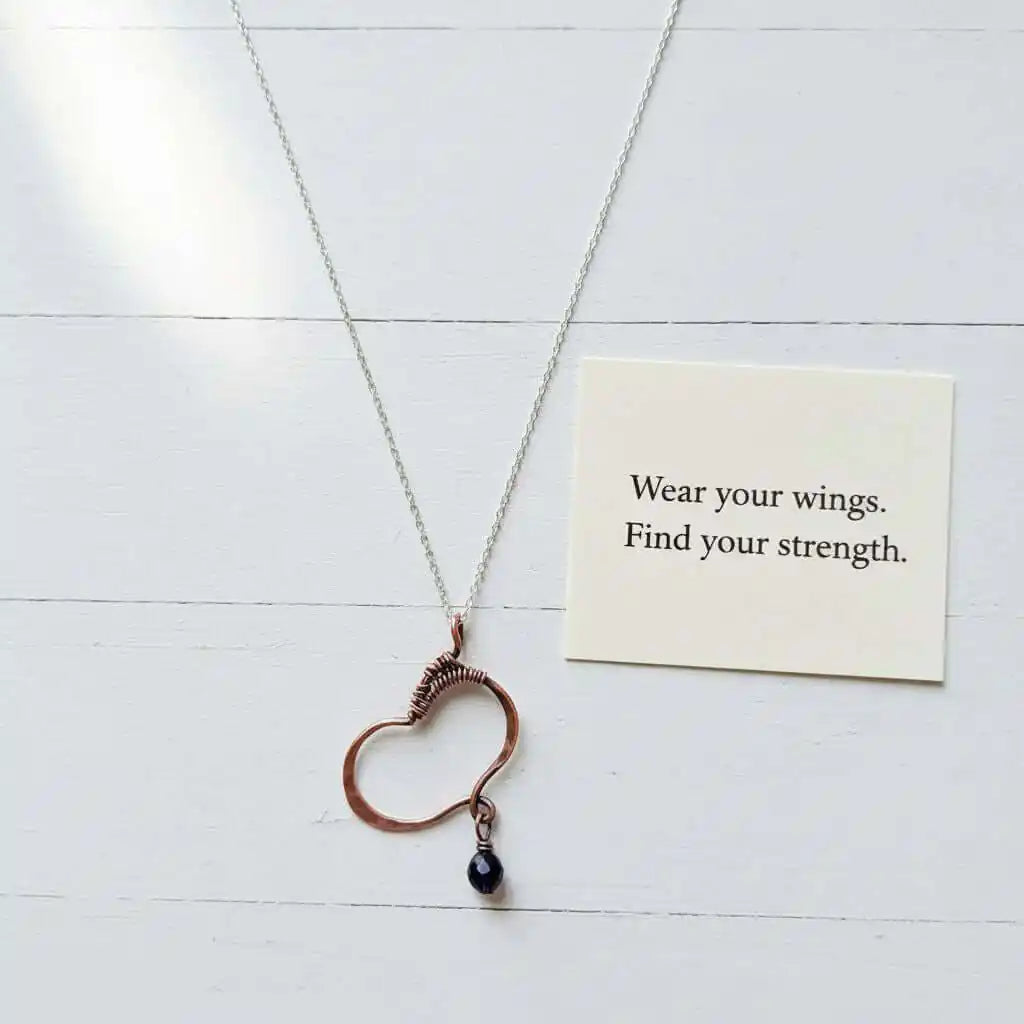 Hammered Copper Butterfly Wing Child Abuse Survivor Necklace with card that says "Wear your wings. Find your strength."