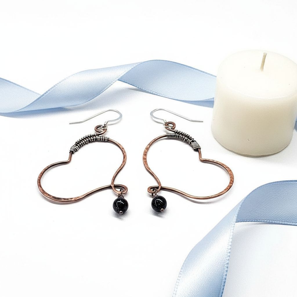 Sculpted Copper Butterfly Wing Abuse Survivor Earrings with black Swarovski crystal dangles and sterling silver ear wires.