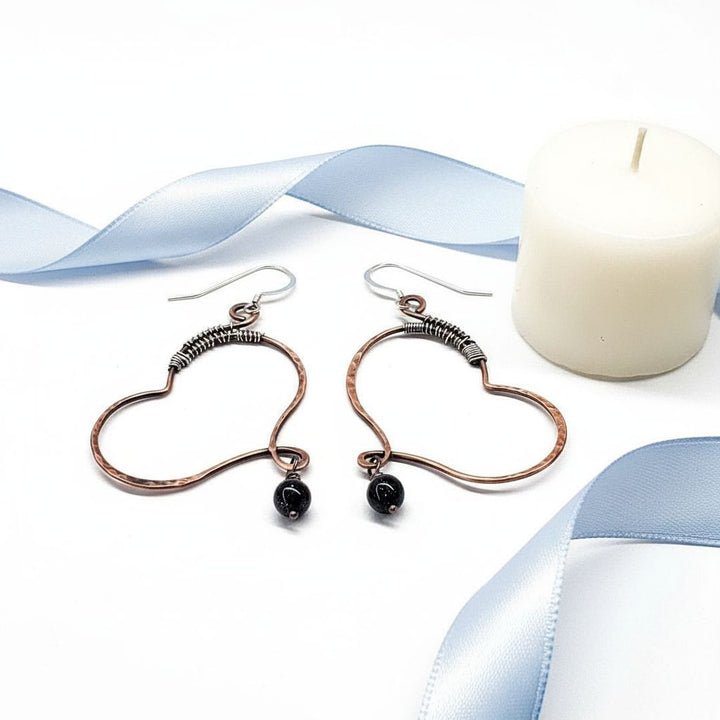 Sculpted Copper Butterfly Wing Abuse Survivor Earrings with black Swarovski crystal dangles and sterling silver ear wires.