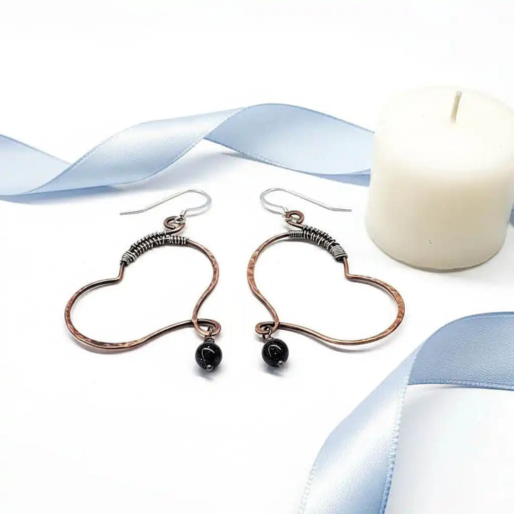 Sculpted Copper Butterfly Wing Abuse Survivor Earrings with black Swarovski crystal dangles and sterling silver ear wires.