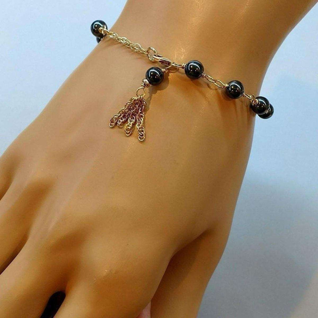 AMD105614 KT Gold Filled Hematite Chain Tassel BraceletsJewelryBracelet$ 59.00Alexa Martha Designs