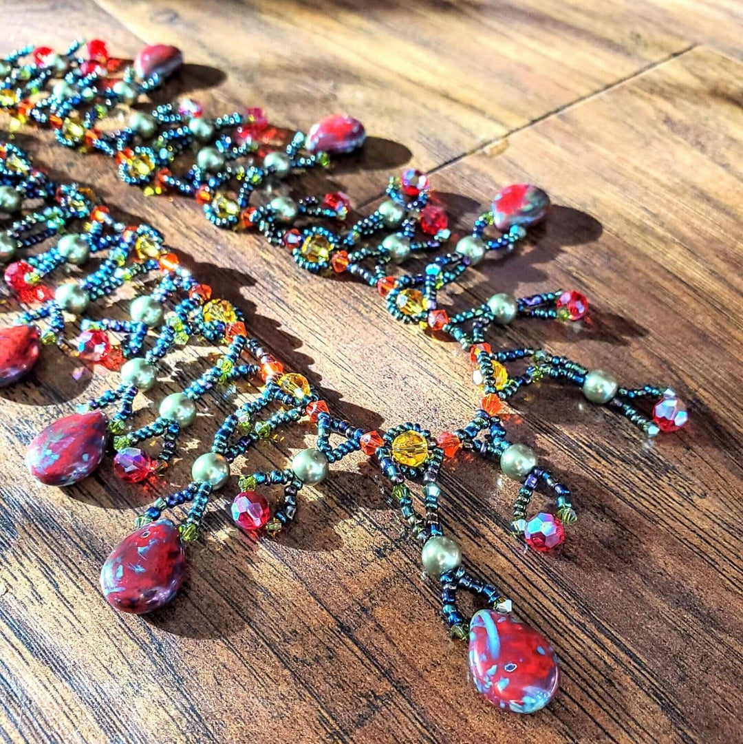 AMDV001Handmade waterfall statement necklace. Red Green beaded glamNecklacesNecklace$ 179.00Alexa Martha Designs