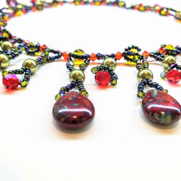 AMDV001Handmade waterfall statement necklace. Red Green beaded glamNecklacesNecklace$ 179.00Alexa Martha Designs