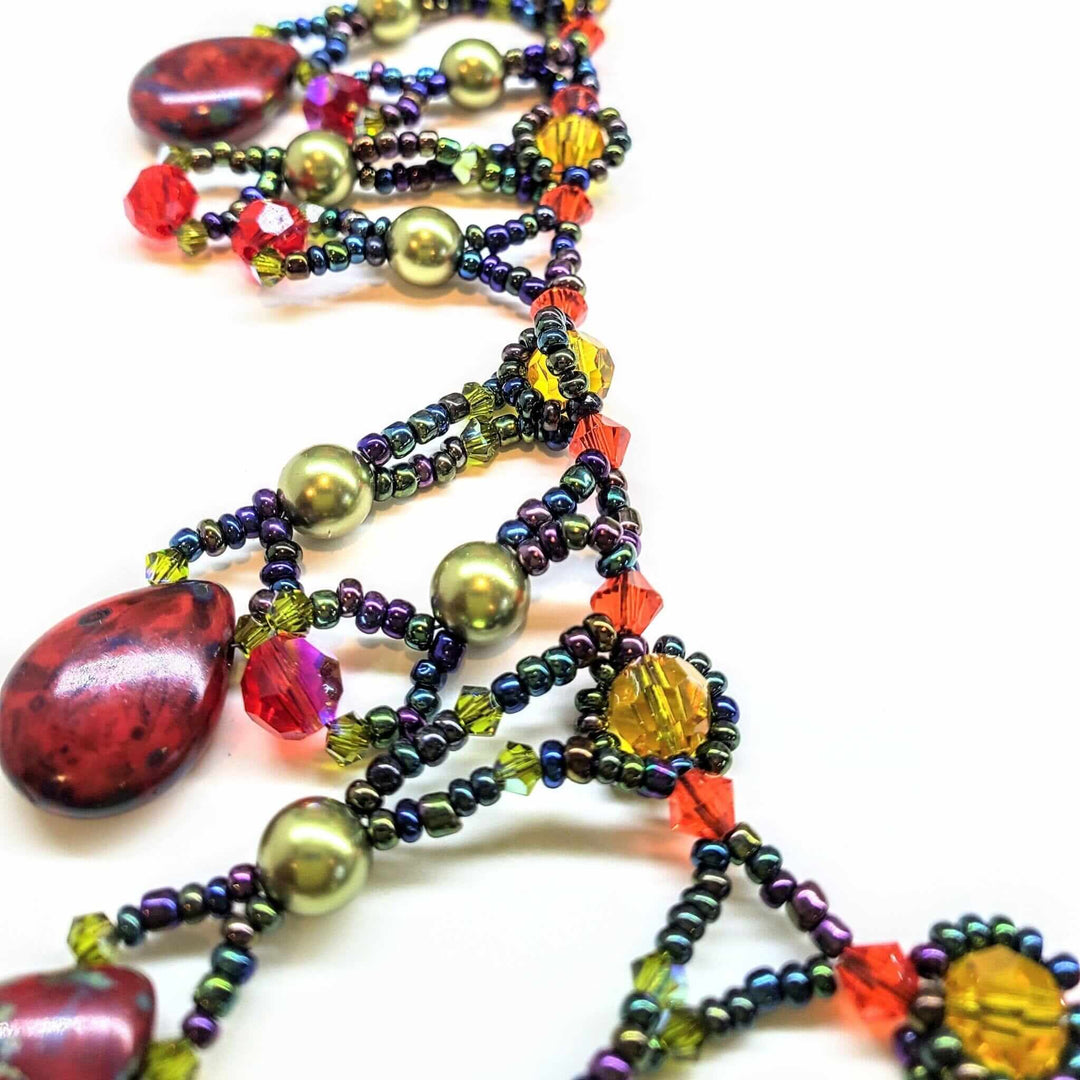 AMDV001Handmade waterfall statement necklace. Red Green beaded glamNecklacesNecklace$ 179.00Alexa Martha Designs