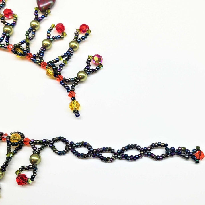 AMDV001Handmade waterfall statement necklace. Red Green beaded glamNecklacesNecklace$ 179.00Alexa Martha Designs