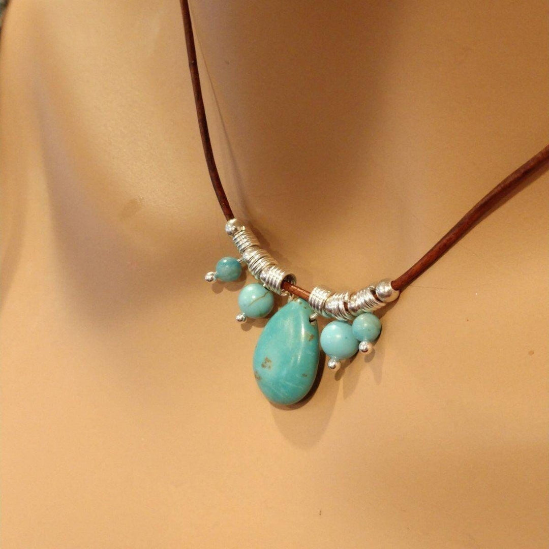 AMD1196 Silver Turquoise Drop Bead Charm Leather NecklaceJewelryNecklace$ 69.00Alexa Martha Designs