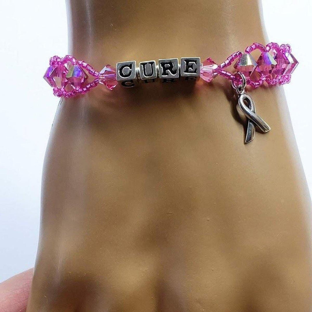 AMD1184 Sparkly Pink Breast Cancer Awareness Silver Ribbon BraceletJewelryBracelet$ 82.00Alexa Martha Designs