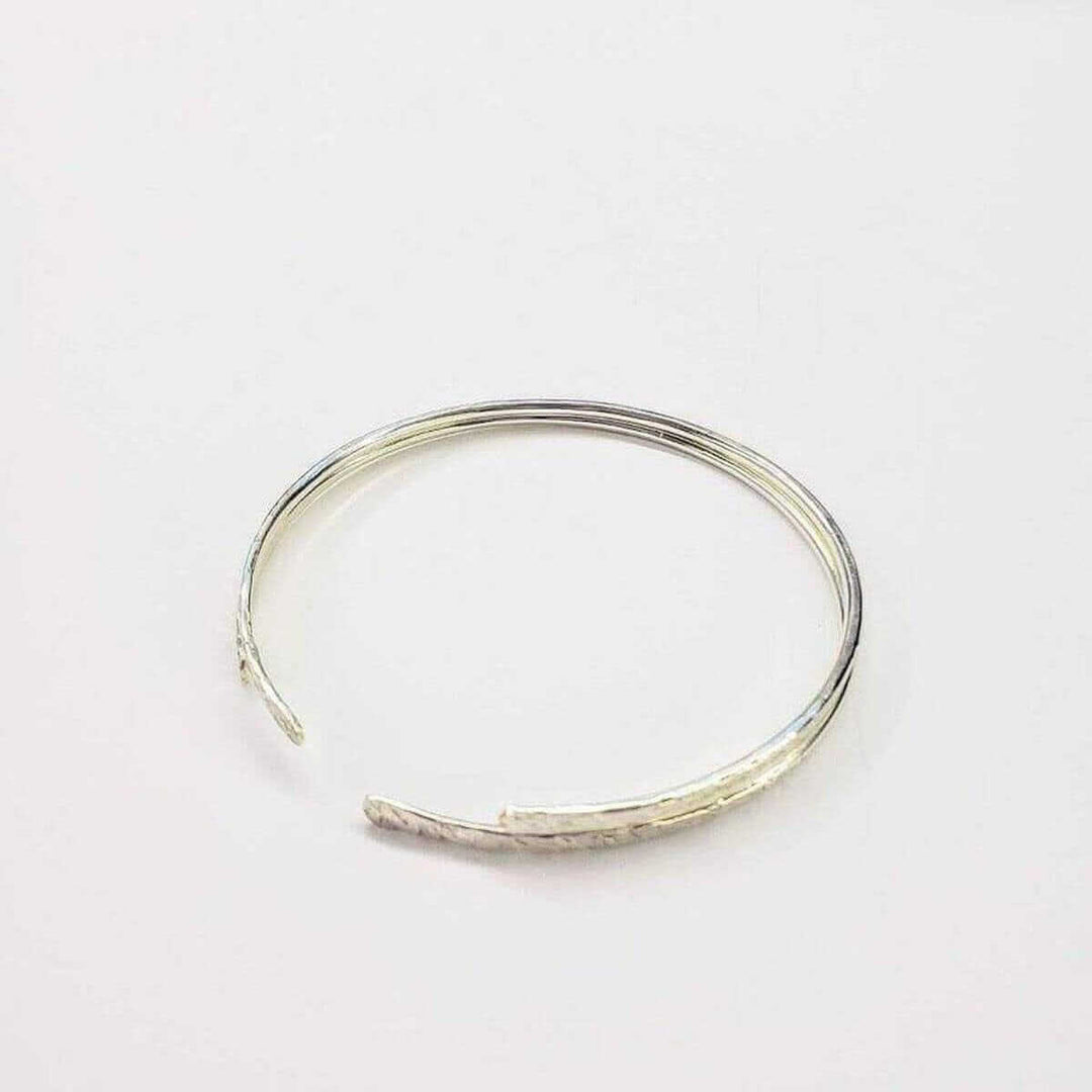 AMD1157 Hammered Sterling Silver Open Bangle Alexa MarthaJewelryBracelet$ 45.00Alexa Martha Designs